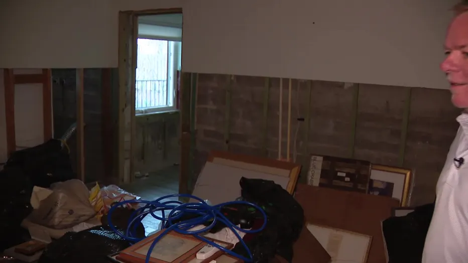 As Storm-Damaged Homes Still Await  Permits, One Resident Takes Action